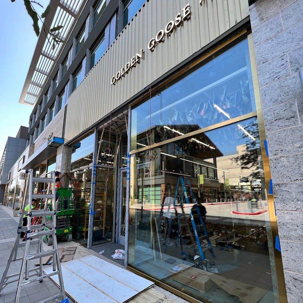 Blu's crew cleaning a storefront