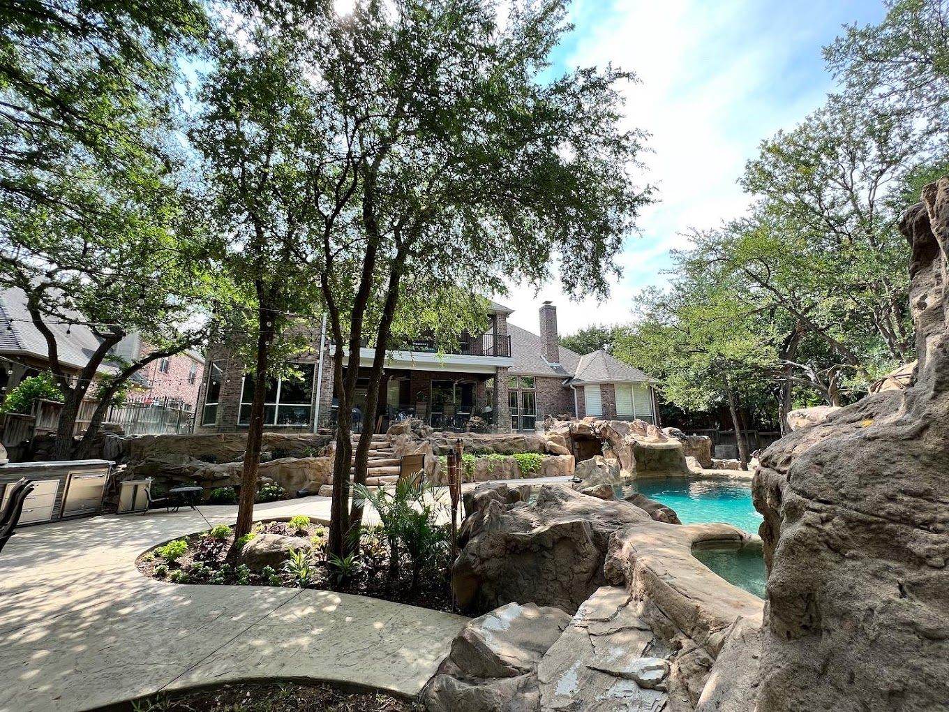 Pressure washed stone patio and pool deck